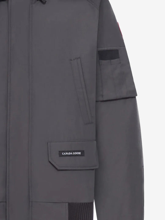 Close up of the grey jacket, showing texture of the polyester and cotton fabric