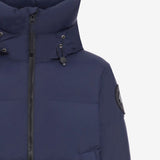 Close up of the navy coat, showing texture of the polyamide fabric