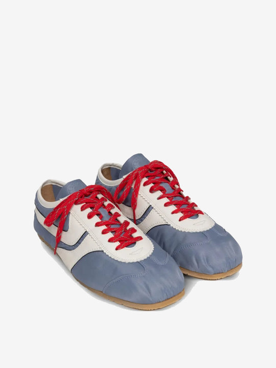 Blue sneakers, side view