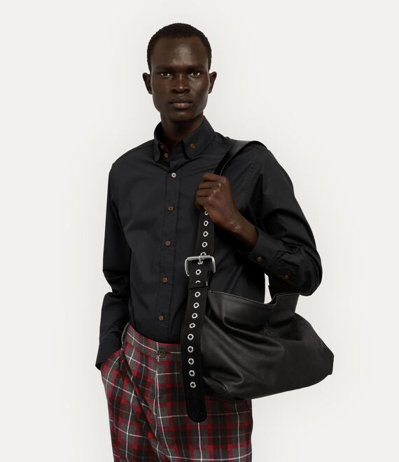 Black bag worn by a person, showing the bag fit