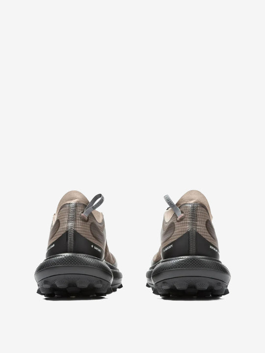 Tan sneakers, back view