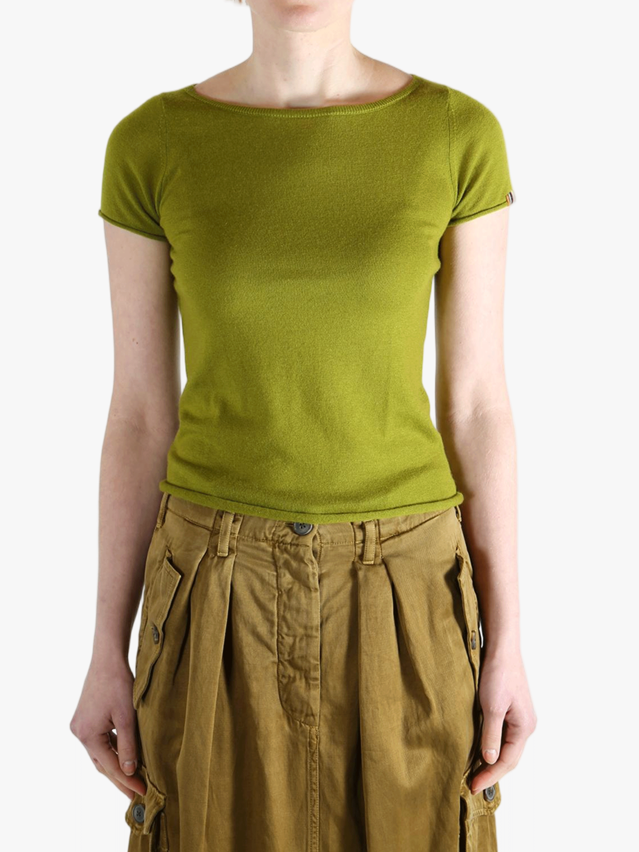 Green t-shirt worn by a person, showing the shirt's fit