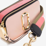 Close up of pink bag, showing texture of the cotton fabric