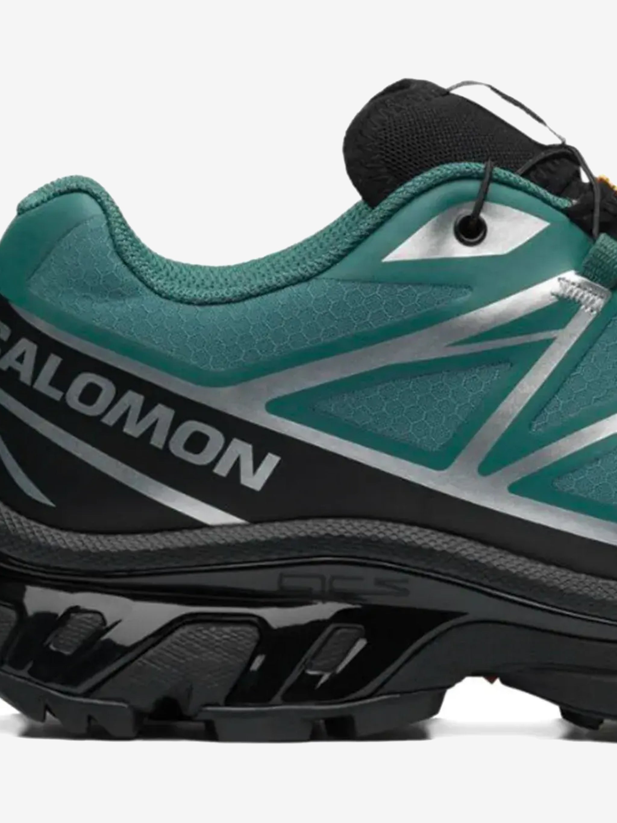 Close up of green sneakers, showing texture of the fabric