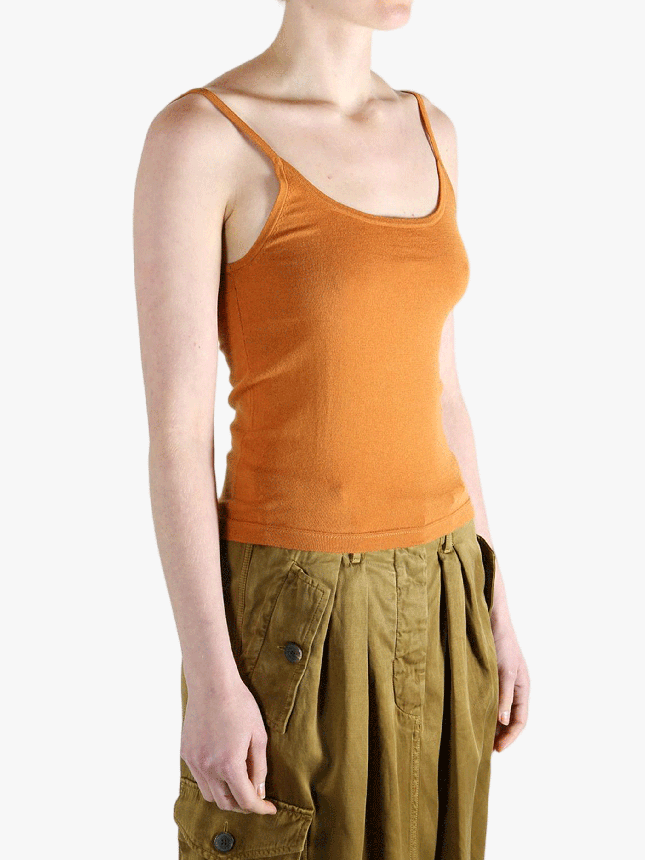 Orange tank top worn by a person, showing the top fit