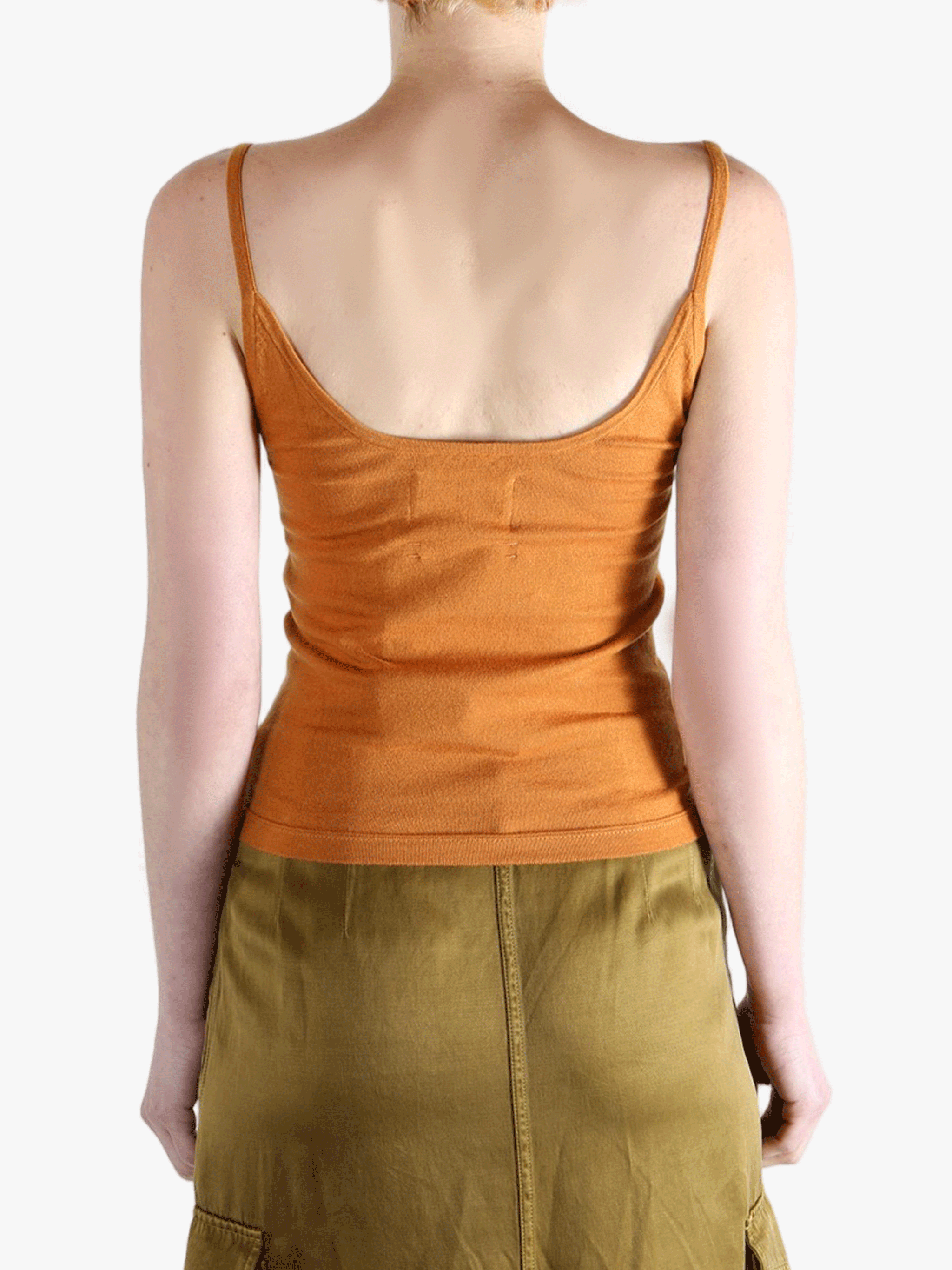 Orange tank top worn by a person, showing the top fit