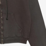 Close up of the black hoodie, showing texture of the cotton fabric