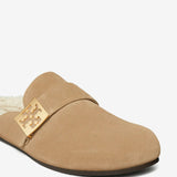 Close up of tan mules, showing texture of the suede fabric