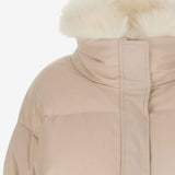 Close up of pink jacket, showing texture of the rabbit fur fabric