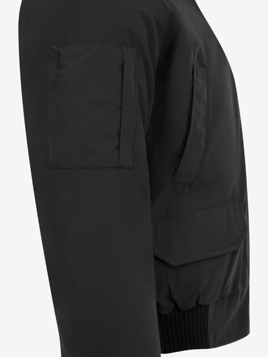 Close up of black bomber, showing texture of the polyamide fabric