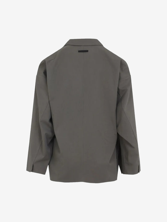 Grey blazer, back view showing straight hemline