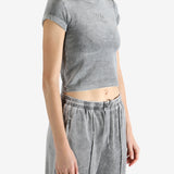 Grey t-shirt worn by a person, showing the t-shirt's fit