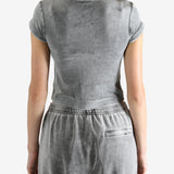 Grey t-shirt worn by a person, showing the t-shirt's fit