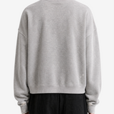  Grey hoodies worn by a person, showing the hoodies  fit