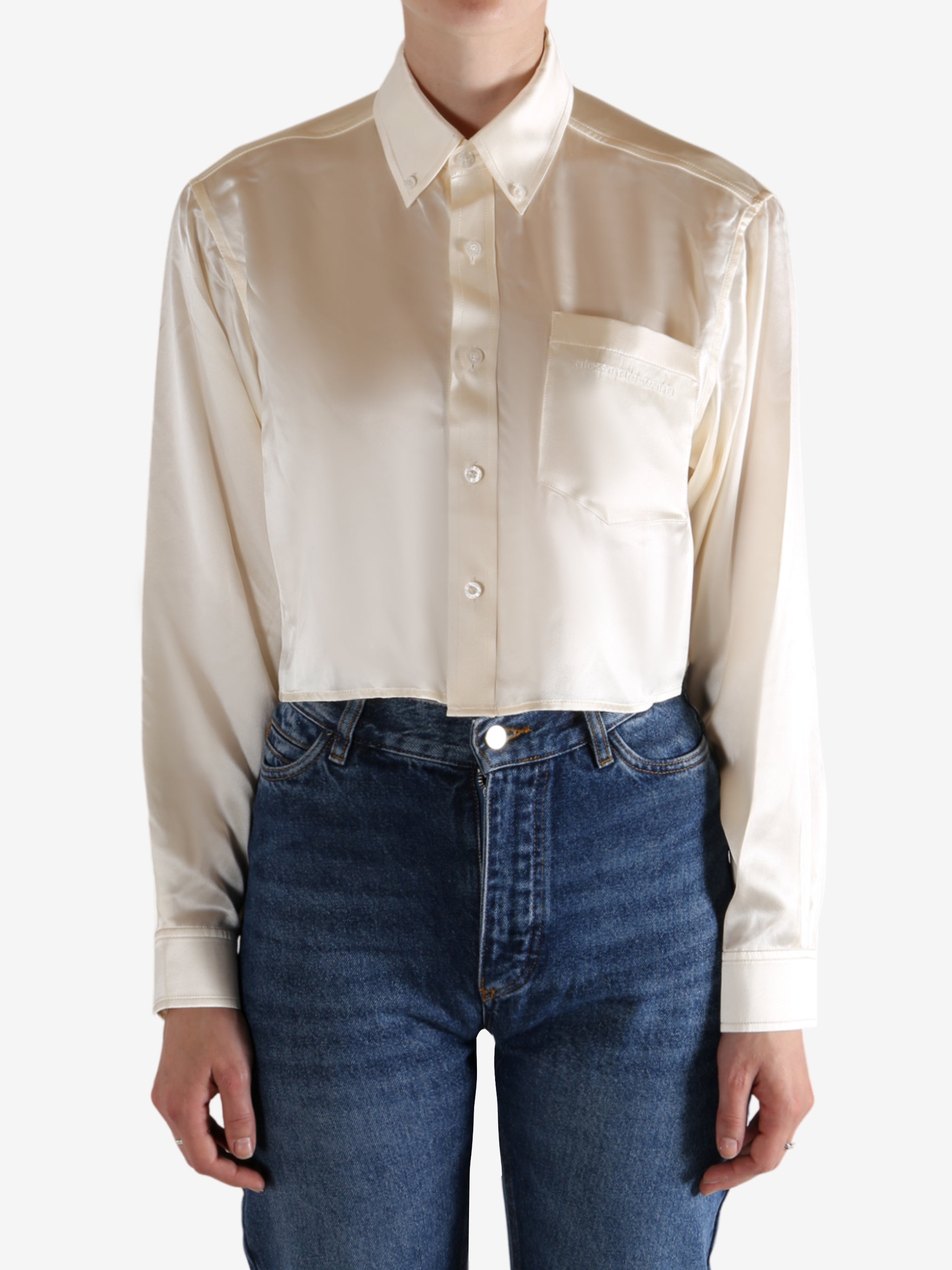 Tan shirts worn by a person, showing the shirts fit