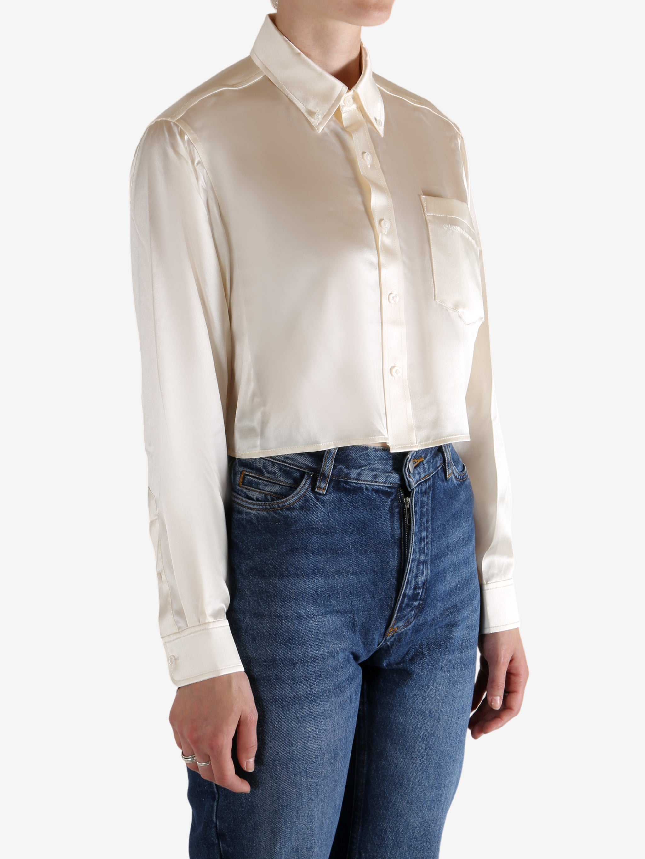 Tan shirts worn by a person, showing the shirts fit