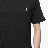 Close up of black t-shirt, showing texture of the cotton fabric