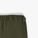 Close up of green skirts, showing texture of the Cotton fabric