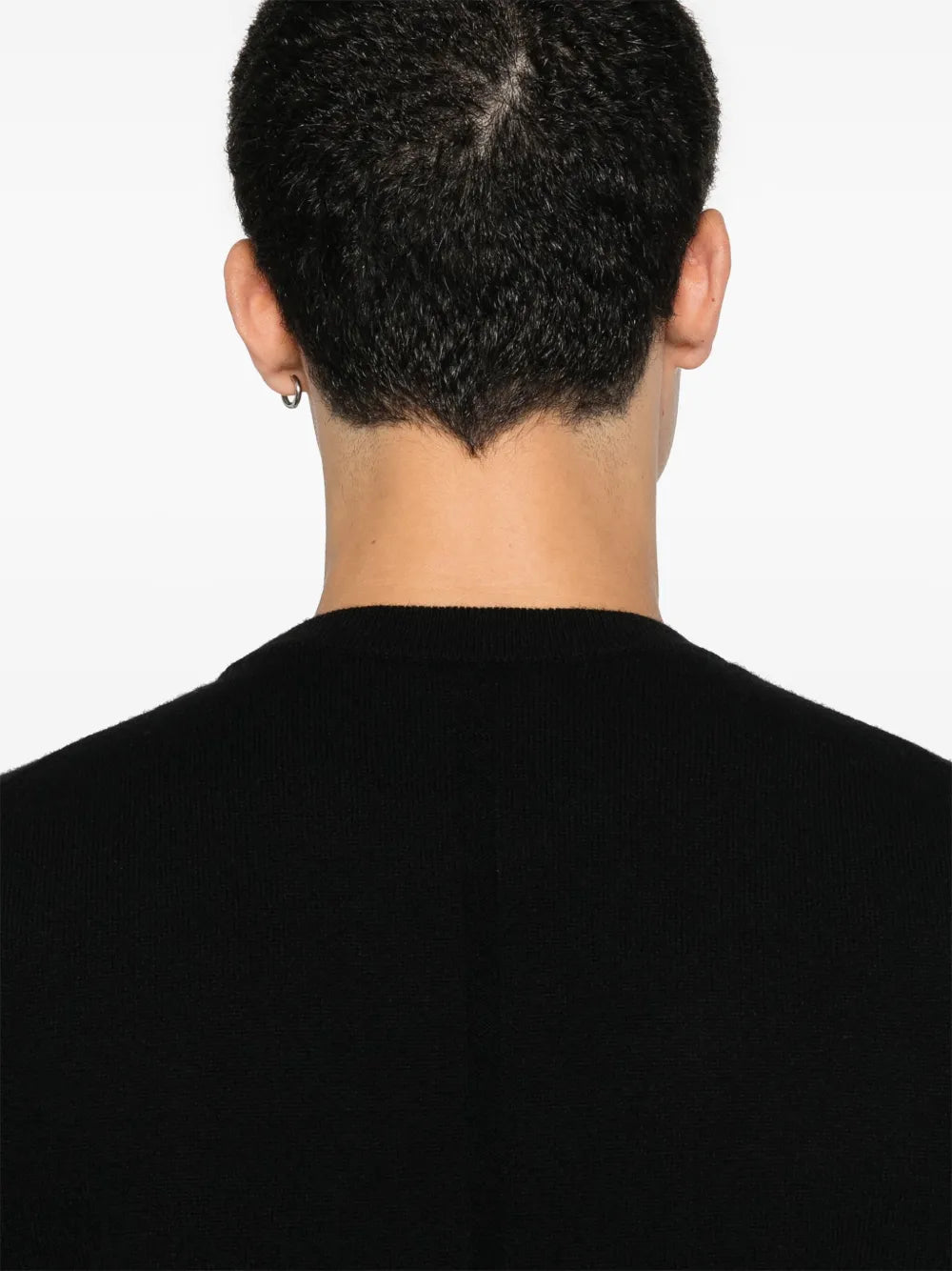 Close up of black sweater,showing texture of the triacetate fabric