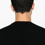 Close up of black sweater,showing texture of the triacetate fabric