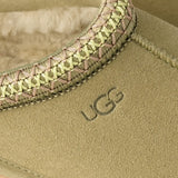 Close-up of a green shoes,showing texture of the suede fabric.