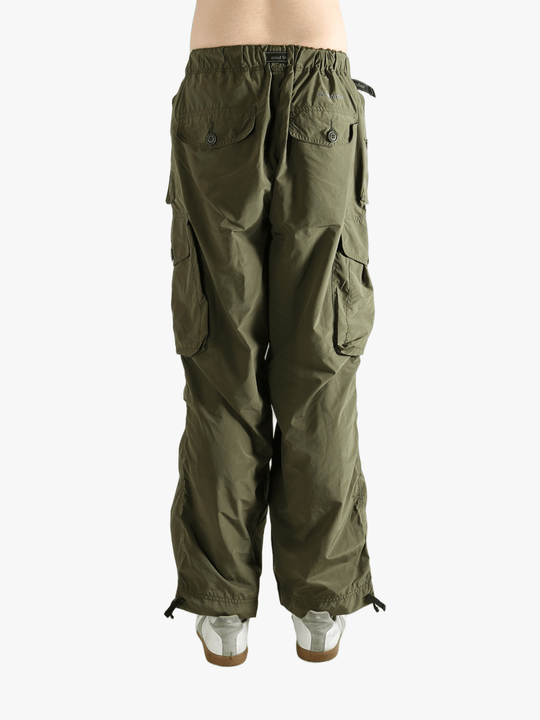Green pants worn by a person, showing the pants fit