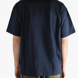 Blue shirt worn by a person, showing the  shirt's fit