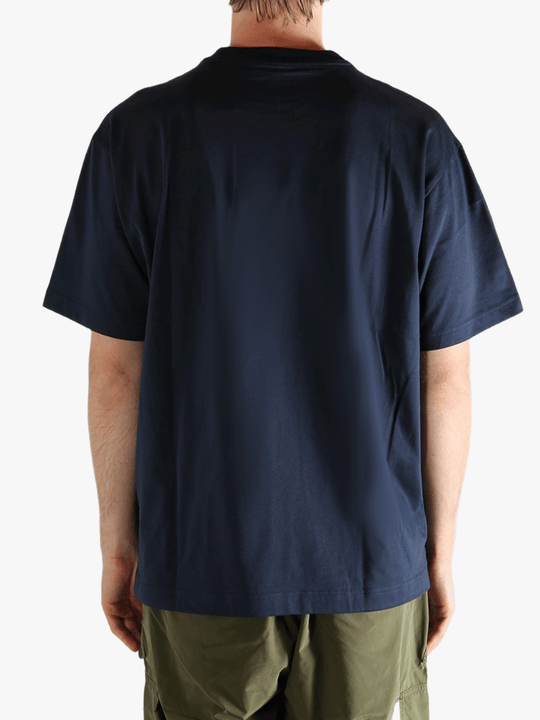 Blue shirt worn by a person, showing the  shirt's fit