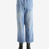 Blue pants worn by a person, showing the pants' fit