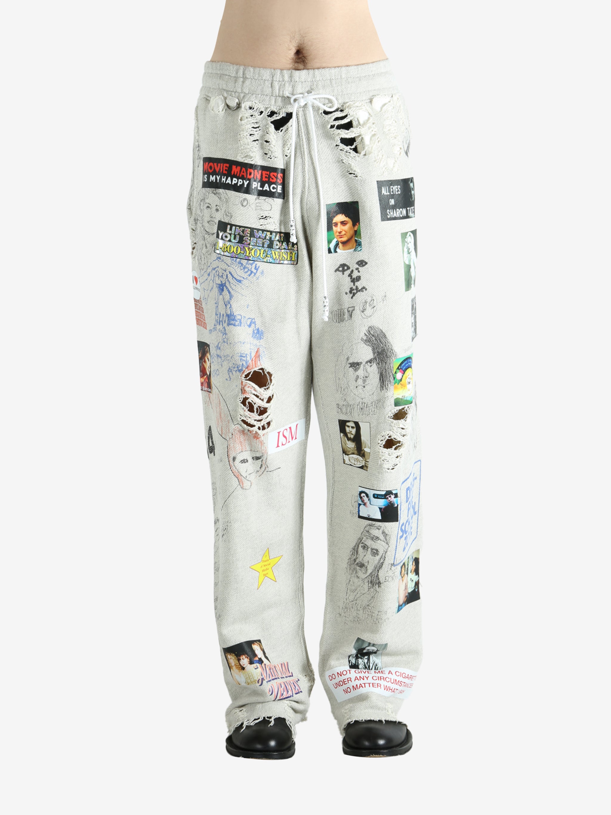 Grey pants worn by a person, showing the pants fit