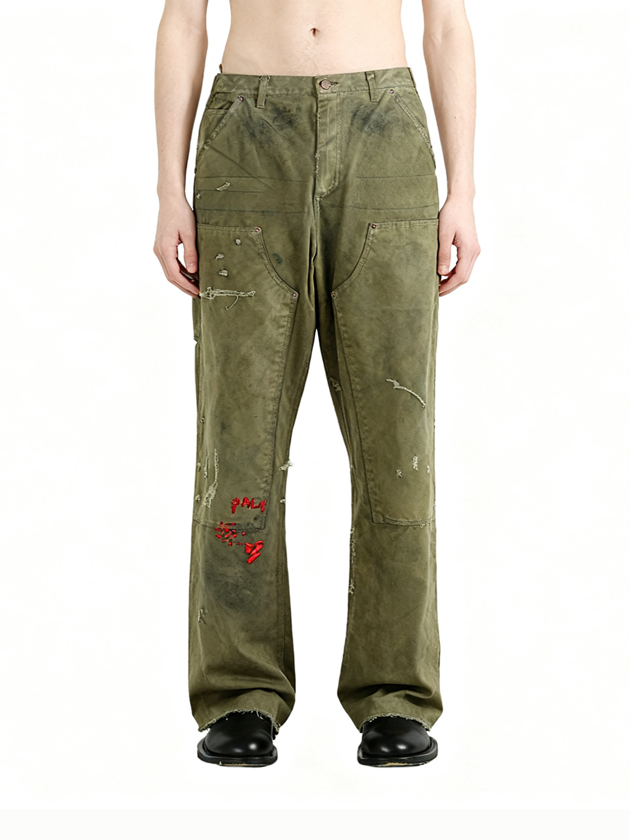 Brown pants worn by a person, showing the pants fit