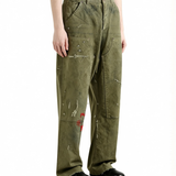 Brown pants worn by a person, side view