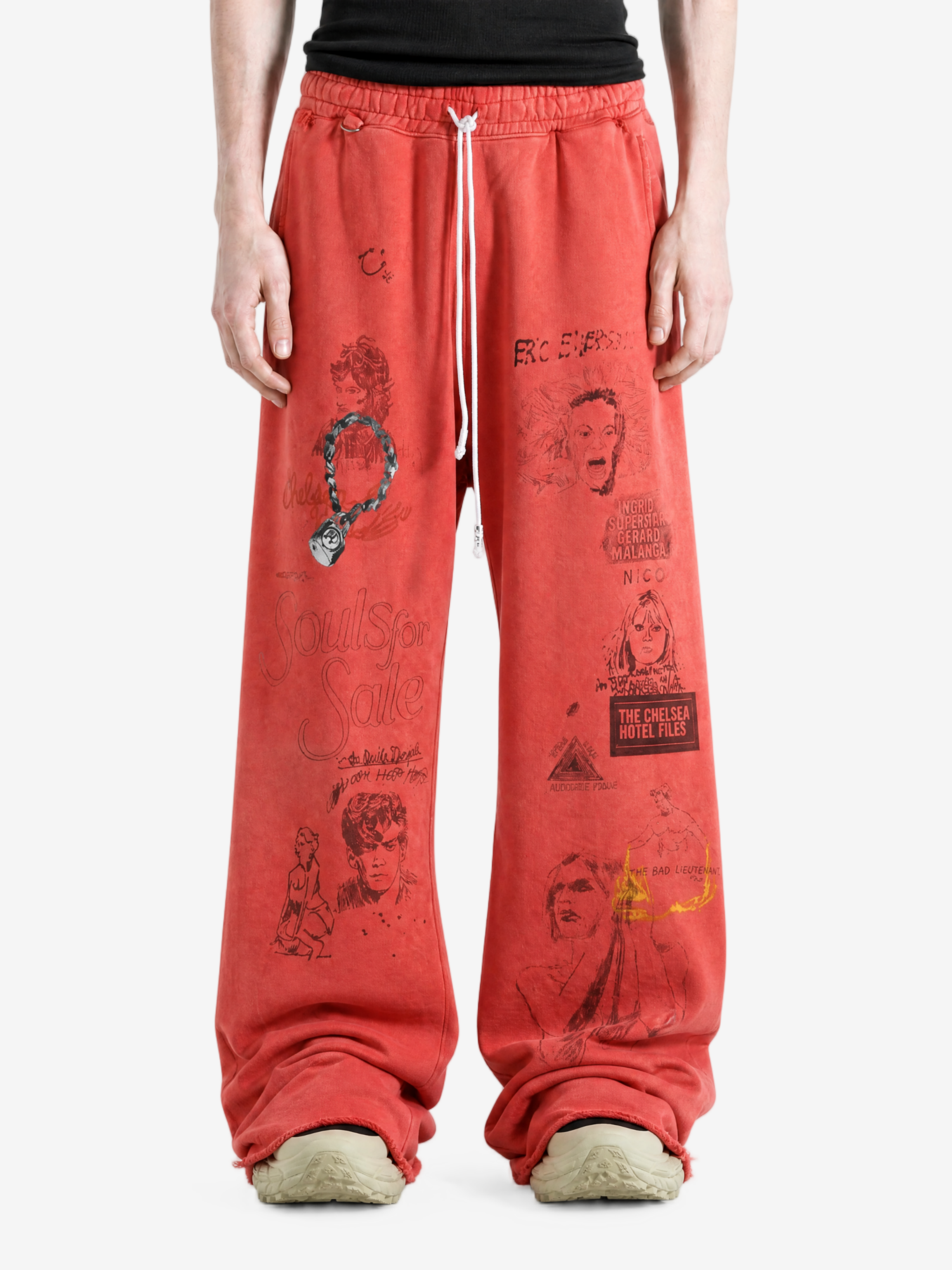 Red pants worn by a person, showing the pants fit