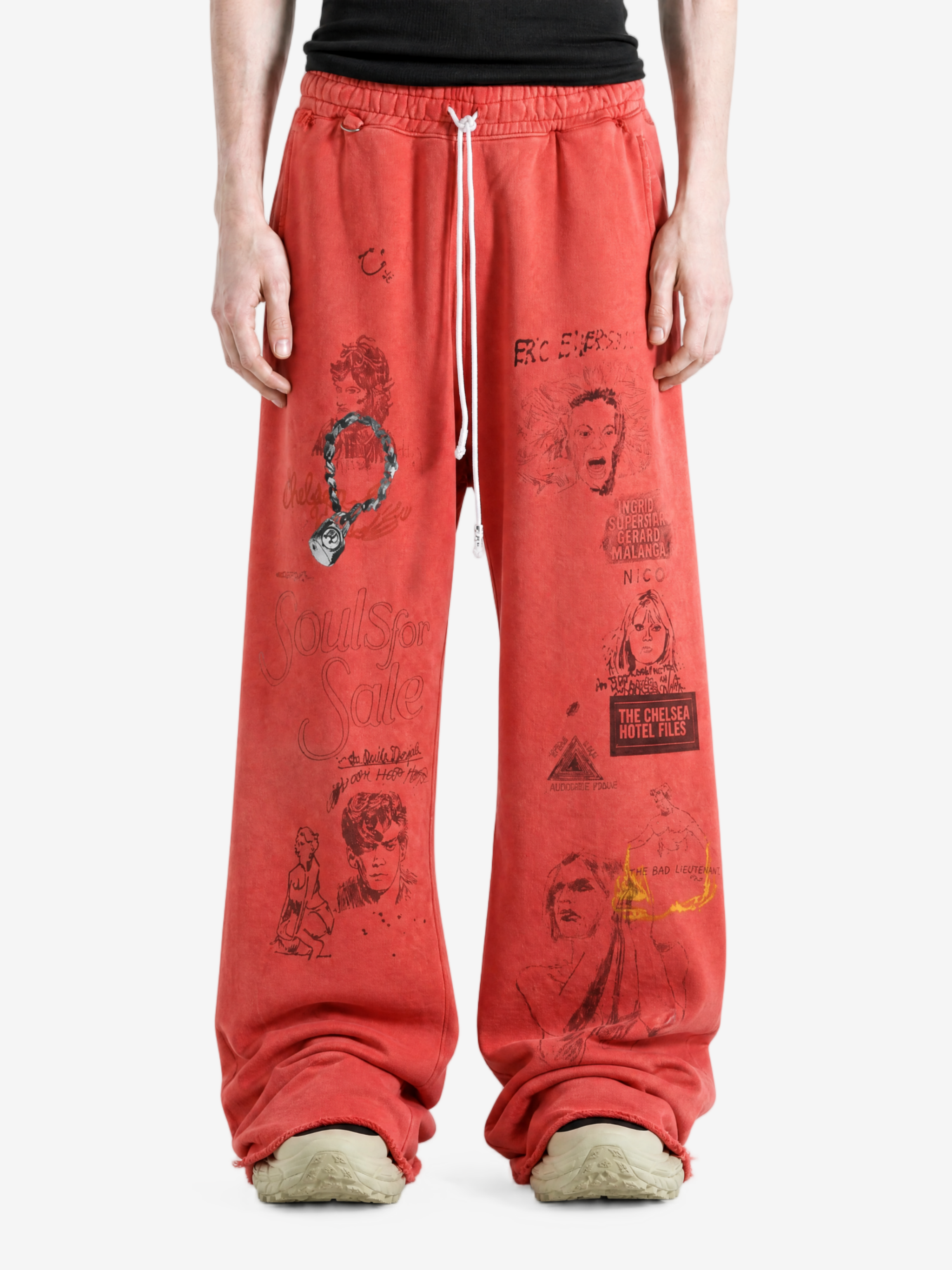 Red pants worn by a person, showing the pants fit