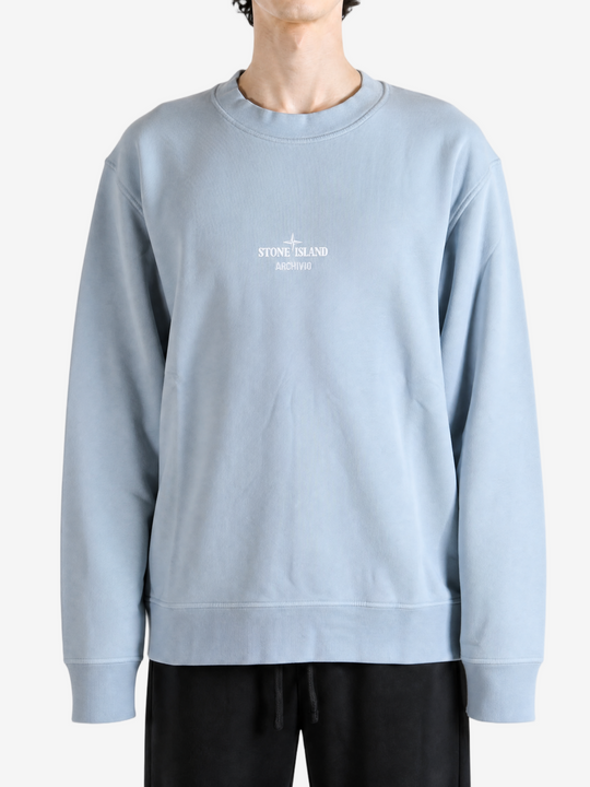 Grey hoodie worn by a person, showing the hoodie fit