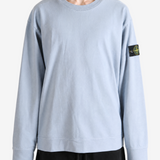 Grey hoodie worn by a person, showing the hoodie fit