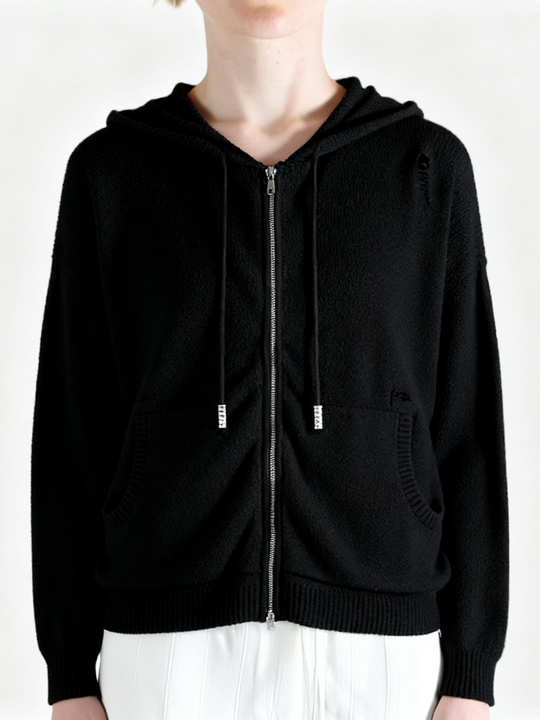 Black hoodie worn by a person, showing the hoodie fit