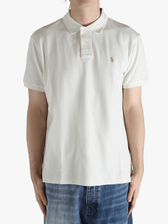 White shirt worn by a person, showing the shirt's fit