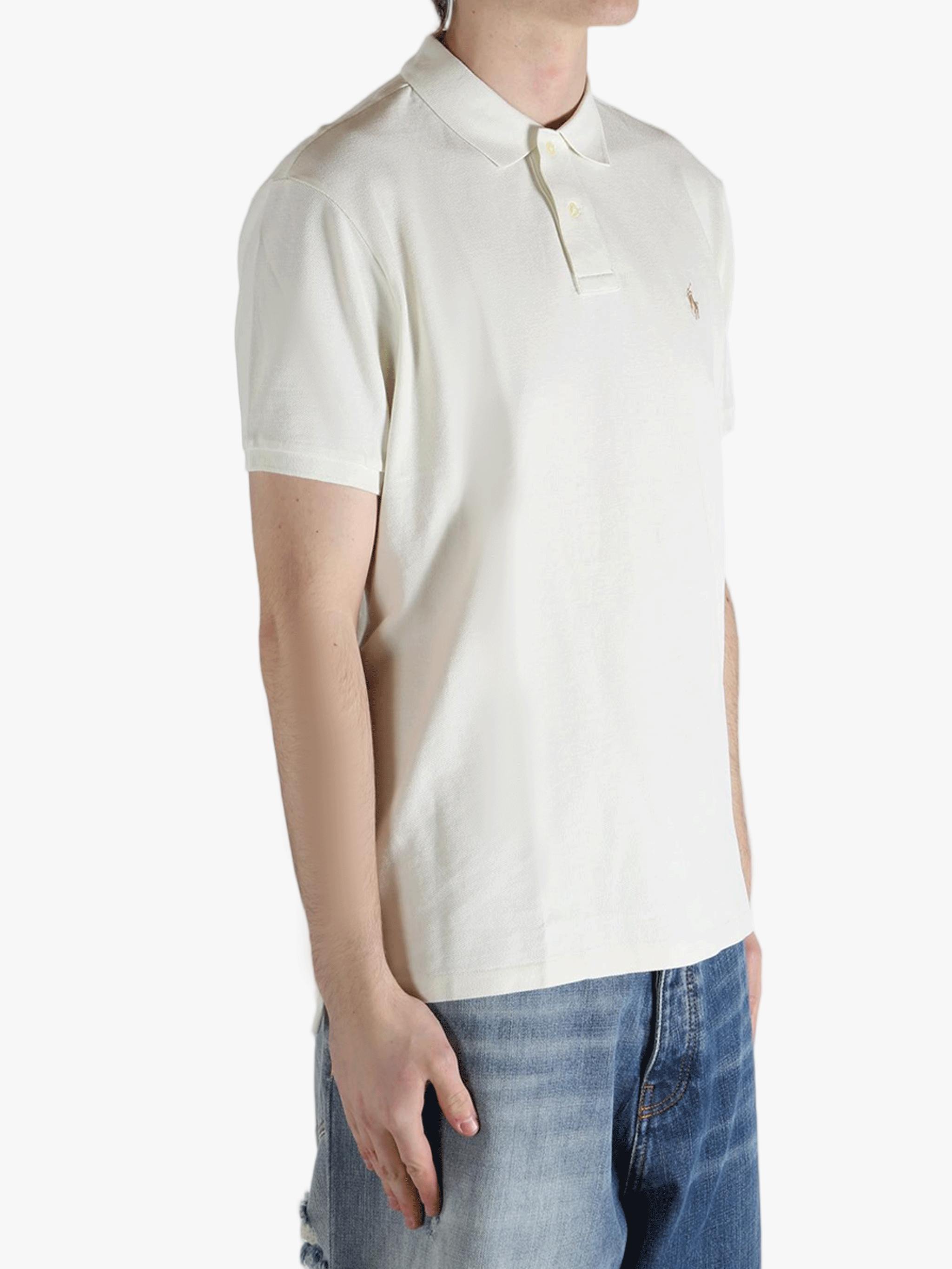 White shirt worn by a person, showing the shirt's fit