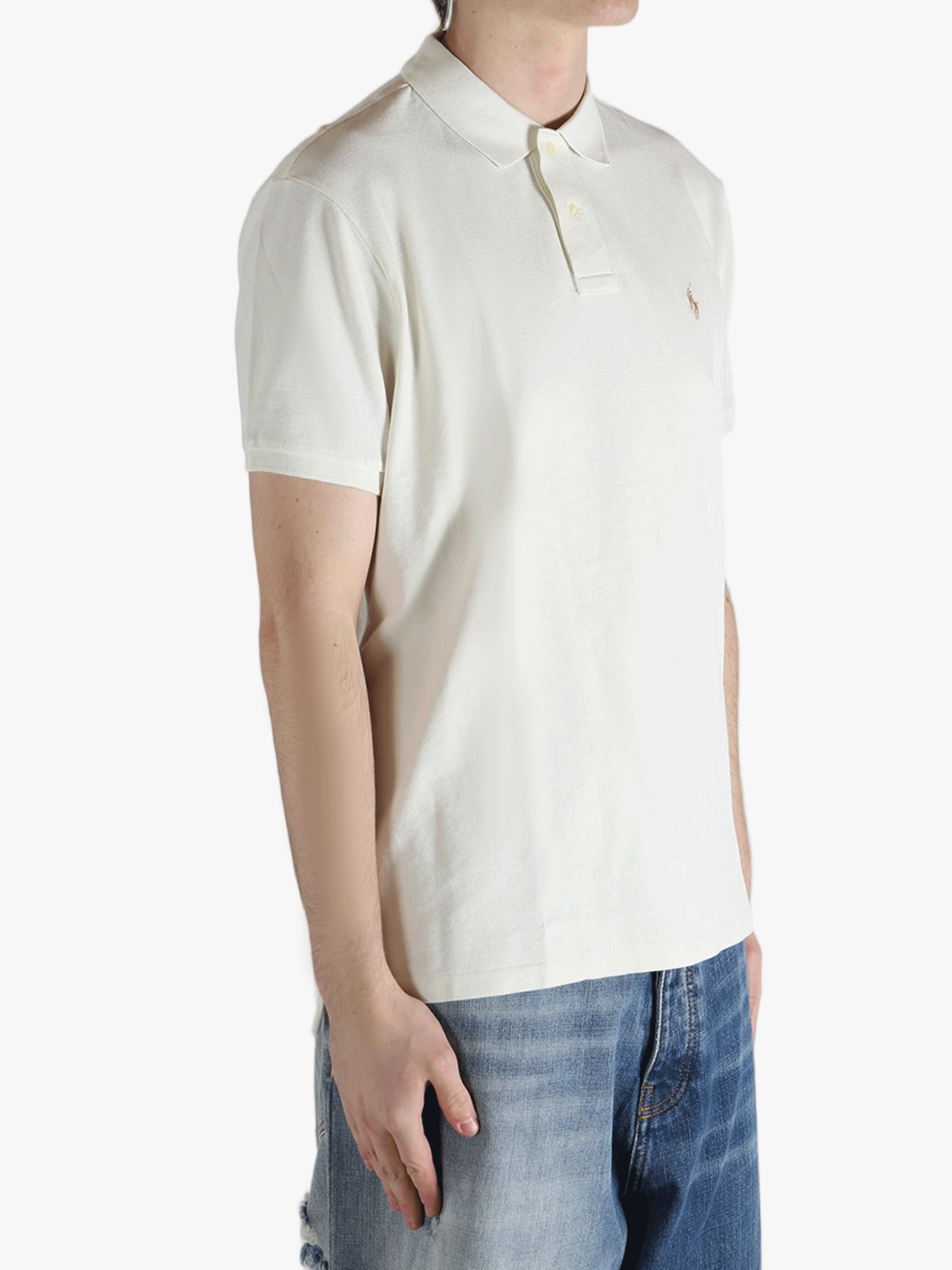 White shirt worn by a person, showing the shirt's fit