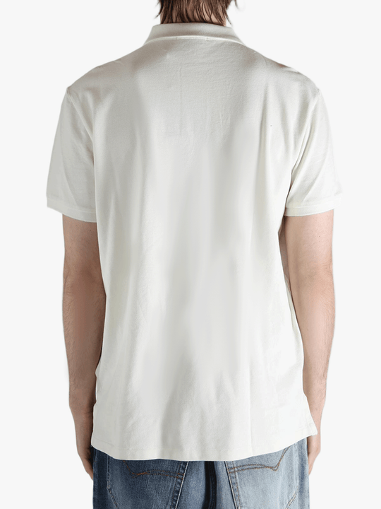 White shirt worn by a person, showing the shirt's fit