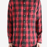 Red shirts worn by a person, showing the shirts fit