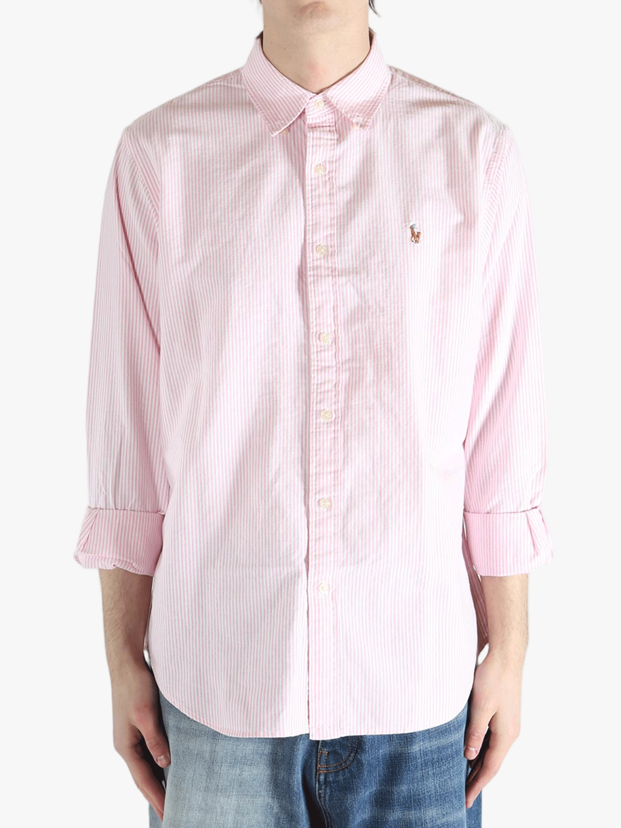 Pink shirt worn by a person, showing the shirt's fit