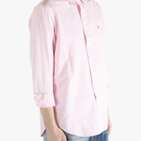 Pink shirt worn by a person, showing the shirt's fit