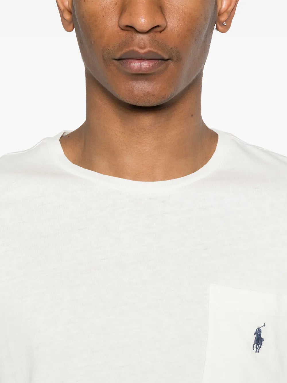 Close up of  white t-shirt,showing texture of the cotton fabric.