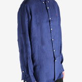 Navy shirts worn by a person, showing the shirts fit