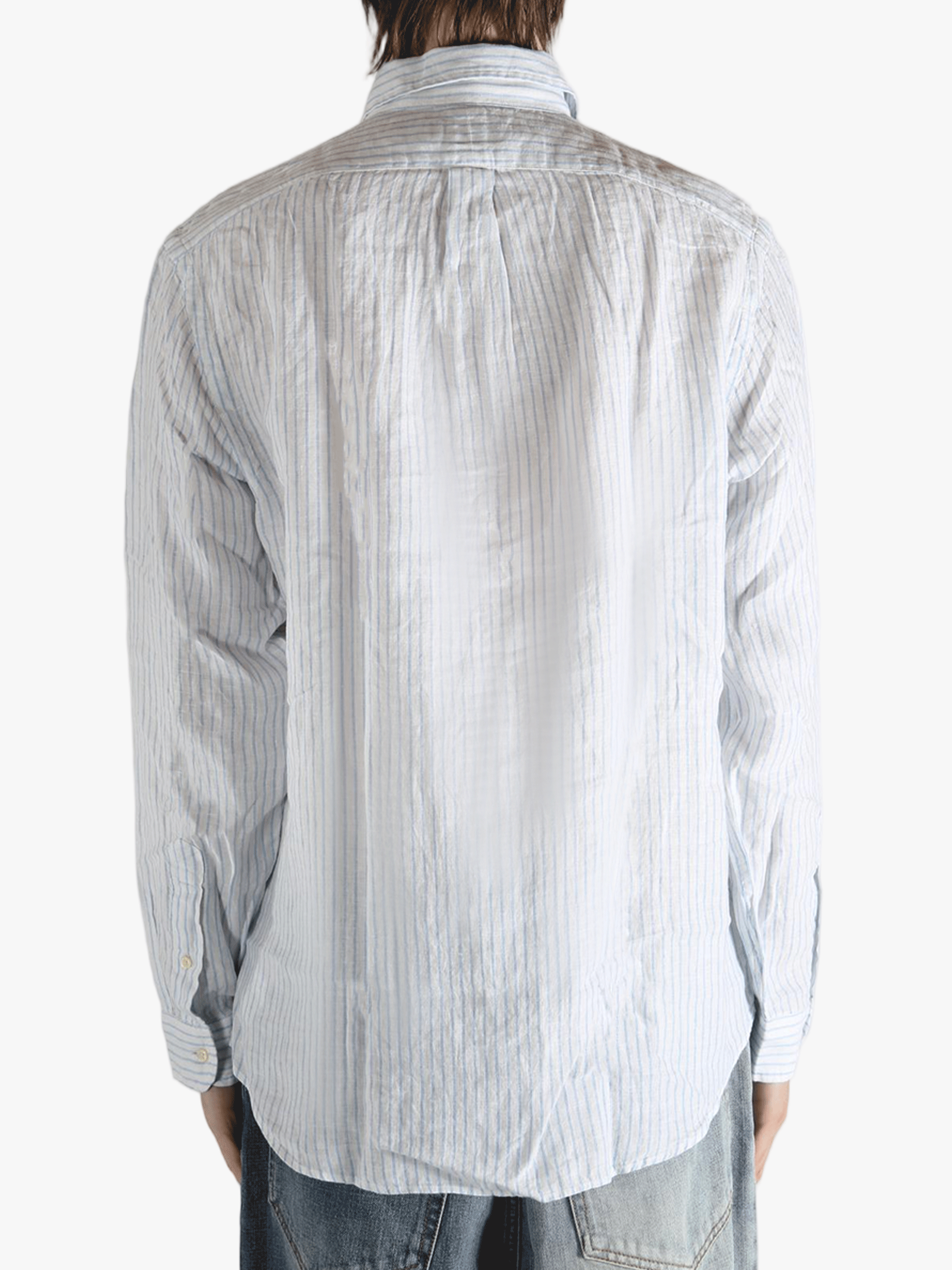 Blue shirt worn by a person, showing the shirt's fit