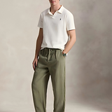 White shirt worn by a person, showing the shirt's fit