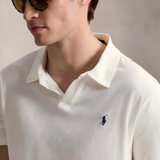 White shirt worn by a person, showing the shirt's fit