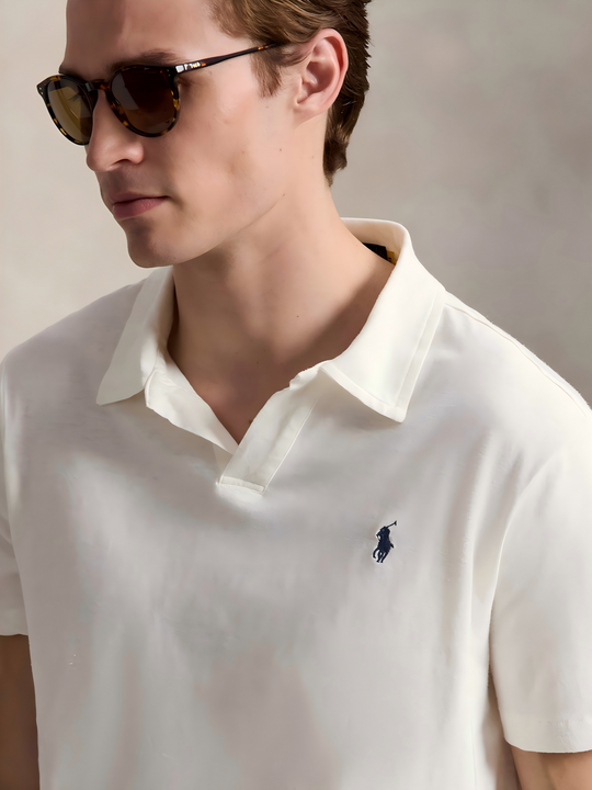 White shirt worn by a person, showing the shirt's fit
